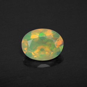 Ópalo multicolor natural de 0,94 ct, corte óvalo, transparente