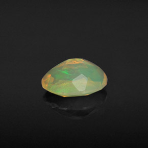 Ópalo multicolor natural de 0,94 ct, corte óvalo, transparente