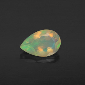 Ópalo multicolor natural de 0,58 ct, en forma de pera, transparente