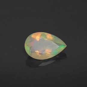 Ópalo multicolor natural de 0,58 ct, en forma de pera, transparente