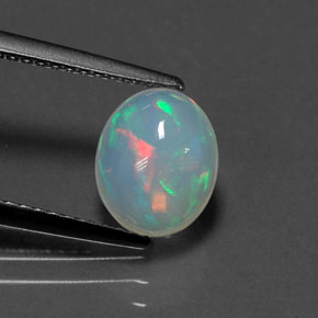 Ópalo multicolor natural de 1,29 ct, corte óvalo, transparente