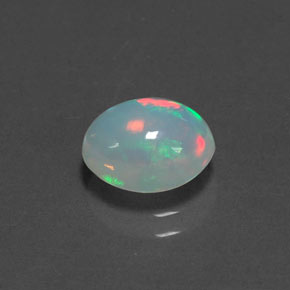 Ópalo multicolor natural de 1,29 ct, corte óvalo, transparente