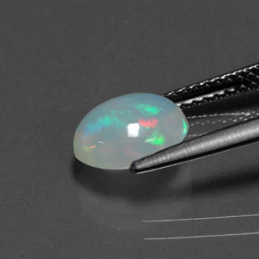 Ópalo multicolor natural de 1,29 ct, corte óvalo, transparente