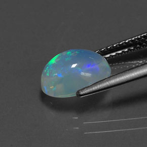 Ópalo multicolor natural de 1,44 ct, corte óvalo, transparente