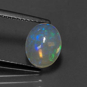 Ópalo multicolor natural de 1,11 ct, corte óvalo, transparente