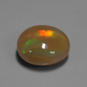 Ópalo multicolor natural de 9,93 ct, corte óvalo, translúcido