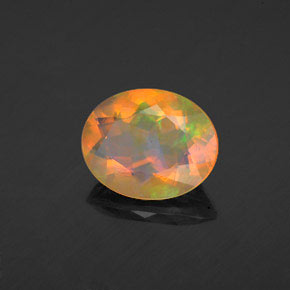 Ópalo multicolor natural de 1,56 ct, corte óvalo, transparente
