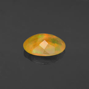 Ópalo multicolor natural de 1,48 ct, corte óvalo, transparente