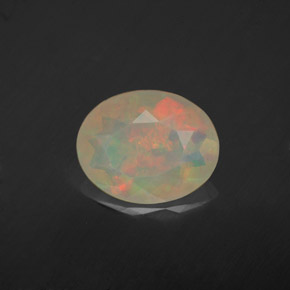 Ópalo multicolor natural de 1,46 ct, corte óvalo, transparente
