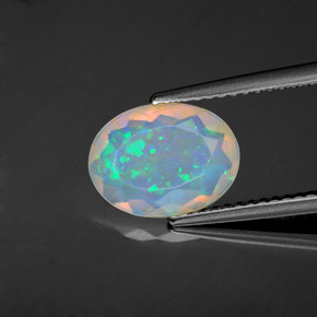 Ópalo multicolor natural de 1,22 ct, corte óvalo, transparente