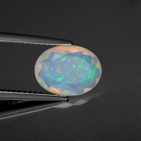 Ópalo multicolor natural de 1,22 ct, corte óvalo, transparente
