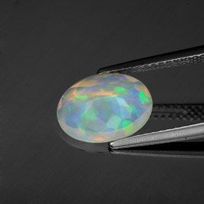 Ópalo multicolor natural de 1,22 ct, corte óvalo, transparente