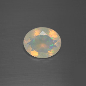 Ópalo multicolor natural de 1,60 ct, corte óvalo, transparente