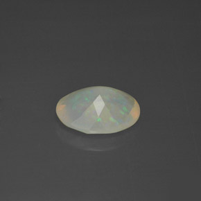 Ópalo multicolor natural de 1,60 ct, corte óvalo, transparente