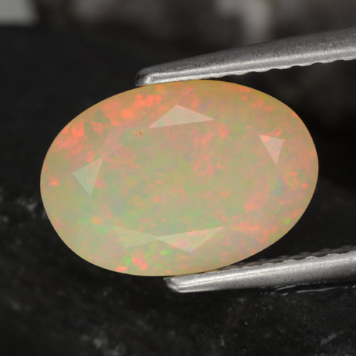 Ópalo multicolor natural de 1,51 ct, corte óvalo, translúcido