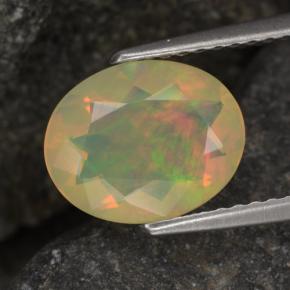 Ópalo multicolor natural de 1,24 ct, corte óvalo, transparente