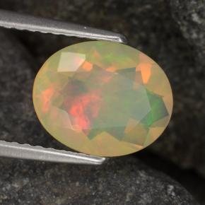 Ópalo multicolor natural de 1,24 ct, corte óvalo, transparente