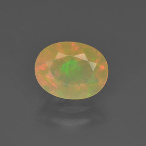 Ópalo multicolor natural de 0,85 ct, corte óvalo, transparente