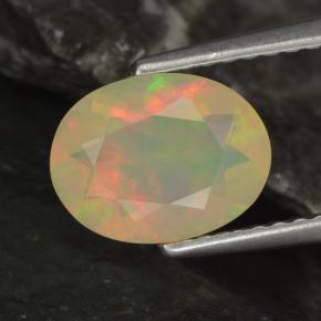 Ópalo multicolor natural de 0,96 ct, corte óvalo, transparente