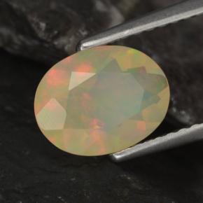 Ópalo multicolor natural de 0,96 ct, corte óvalo, transparente