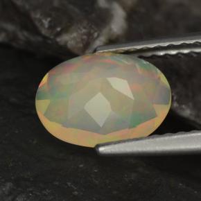 Ópalo multicolor natural de 0,96 ct, corte óvalo, transparente