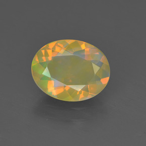 Ópalo multicolor natural de 0,93 ct, corte óvalo, transparente