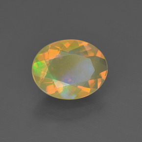 Ópalo multicolor natural de 0,93 ct, corte óvalo, transparente