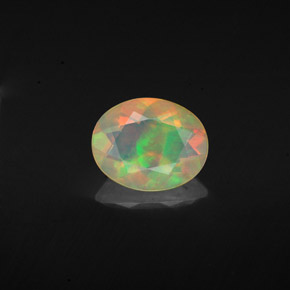 Ópalo multicolor natural de 0,92 ct, corte óvalo, transparente