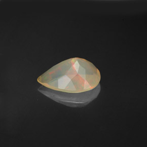 Ópalo multicolor natural de 0,92 ct, en forma de pera, transparente