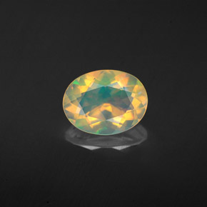 Ópalo multicolor natural de 1,13 ct, corte óvalo, transparente