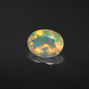 Ópalo multicolor natural de 1,13 ct, corte óvalo, transparente