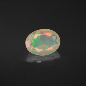 Ópalo multicolor natural de 1,10 ct, corte óvalo, transparente