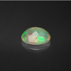 Ópalo multicolor natural de 1,10 ct, corte óvalo, transparente