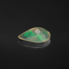 Ópalo multicolor natural de 0,87 ct, en forma de pera, transparente