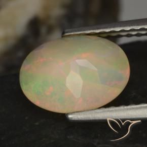 Ópalo Multicolor natural de 1.14 ct, Ovalada, Translúcido