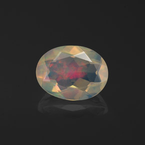 Ópalo multicolor natural de 1,06 ct, corte óvalo, transparente