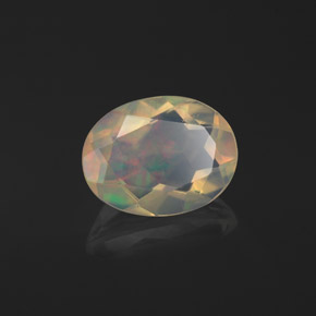 Ópalo multicolor natural de 1,06 ct, corte óvalo, transparente