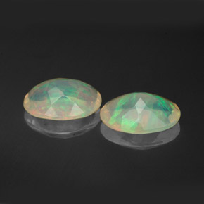 Gemas de ópalo multicolor natural de  ct, corte óvalo, transparente