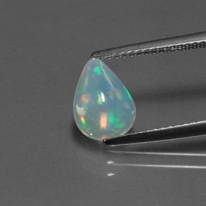 Ópalo multicolor natural de 1,07 ct, en forma de pera, transparente
