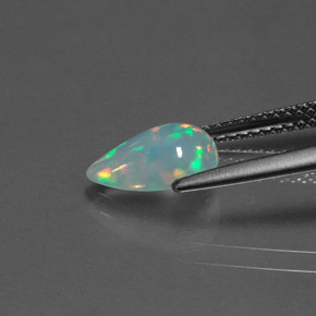 Ópalo multicolor natural de 1,07 ct, en forma de pera, transparente