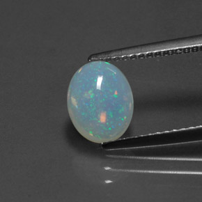 Ópalo multicolor natural de 1,14 ct, corte óvalo, transparente
