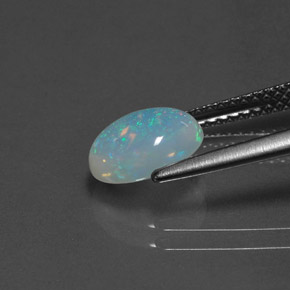 Ópalo multicolor natural de 1,14 ct, corte óvalo, transparente