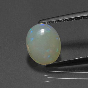 Ópalo multicolor natural de 0,76 ct, transparente, transparente / translúcido