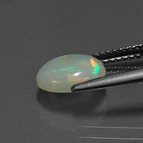 Ópalo multicolor natural de 0,76 ct, transparente, transparente / translúcido