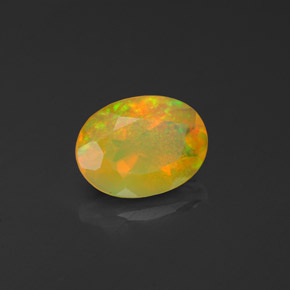Ópalo multicolor natural de 0,90 ct, transparente, transparente / translúcido