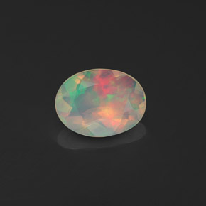 Ópalo multicolor natural de 0,63 ct, transparente, transparente / translúcido
