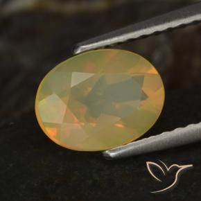 Ópalo Multicolor natural de 0.83 ct, Ovalada, Transparente
