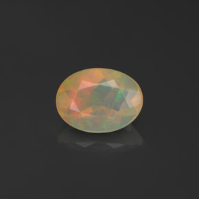 Ópalo multicolor natural de 0,66 ct, transparente, transparente / translúcido