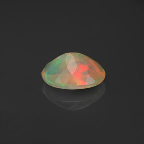 Ópalo multicolor natural de 0,66 ct, transparente, transparente / translúcido