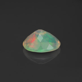 Ópalo multicolor natural de 0,78 ct, transparente, transparente / translúcido